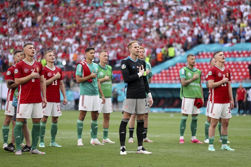 Hungary team celebrates with fans at the end of the Euro 2020 soccer championship group F match between Hungary and France, at the Ferenc Puskas stadium, in Budapest, Saturday, June 19, 2021. The matc ...