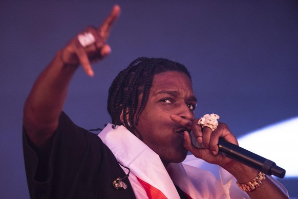 epa09837196 Rapper ASAP Rocky performs during the Lollapalooza 2022 festival at the Cerrillos Bicentennial Park in Santiago, Chile, 19 March 2022. Thousands of young people, fans of music and the fest ...