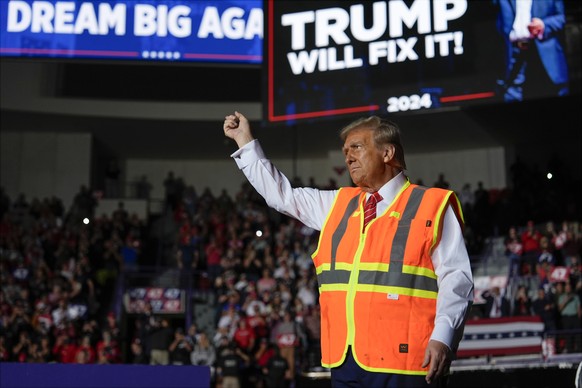 Republican presidential nominee former President Donald Trump gestures after speaking at a campaign rally at Resch Center, Wednesday, Oct. 30, 2024, in Green Bay, Wis. (AP Photo/Julia Demaree Nikhinso ...