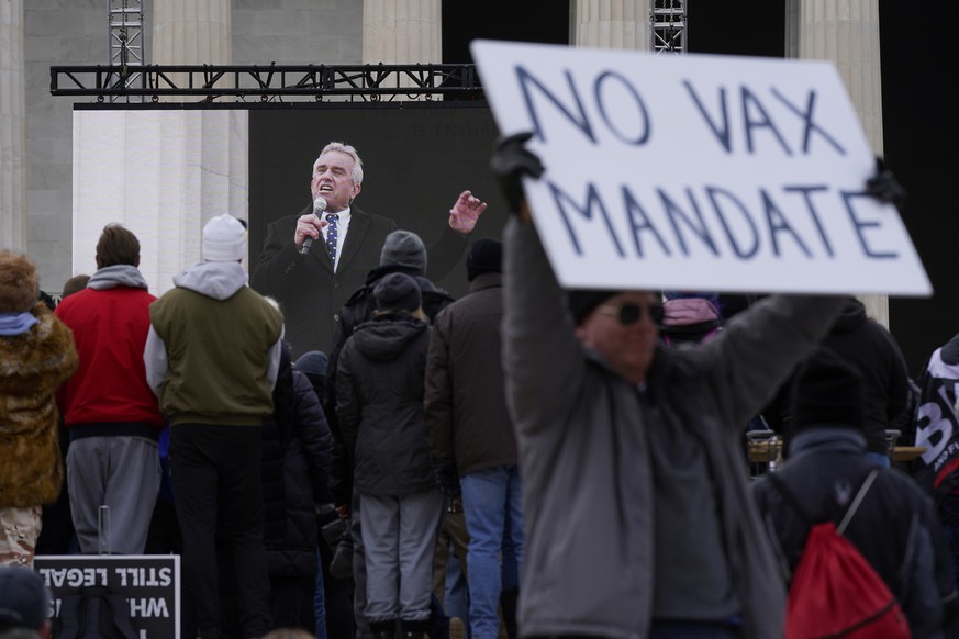 FILE - Robert F. Kennedy Jr., is broadcast on a large screen as he speaks during an anti-vaccine rally in front of the Lincoln Memorial in Washington, Jan. 23, 2022. Instagram and Facebook have suspen ...