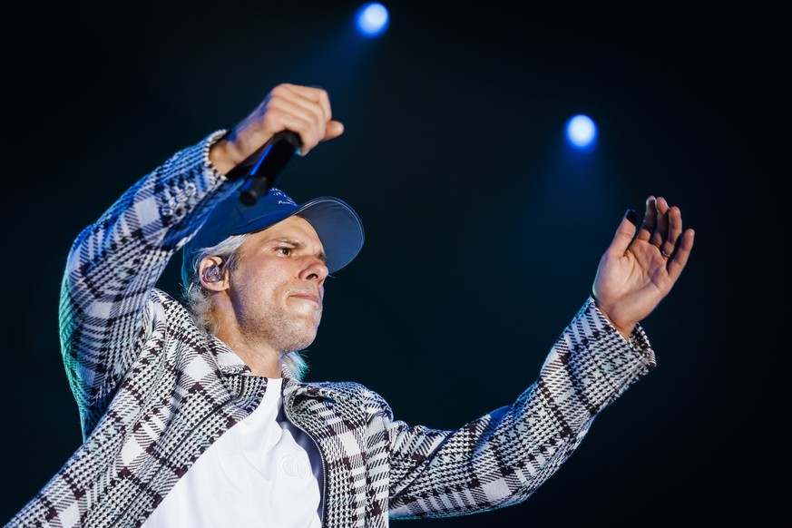 epa10089570 French singer Aurelien Cotentin, aka Orelsan, performs on the main stage during the 45th edition of the Paleo Festival, in Nyon, Switzerland, late 23 July 2022. The Paleo is the largest op ...