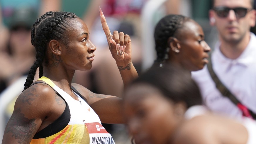 Sha&#039;Carri Richardson reacts after winning her 100m heat during the U.S. Championships athletics meet in Eugene, Ore.,Thursday, July 31, 2025. (AP Photo/Ashley Landis)
US Championships Athletics