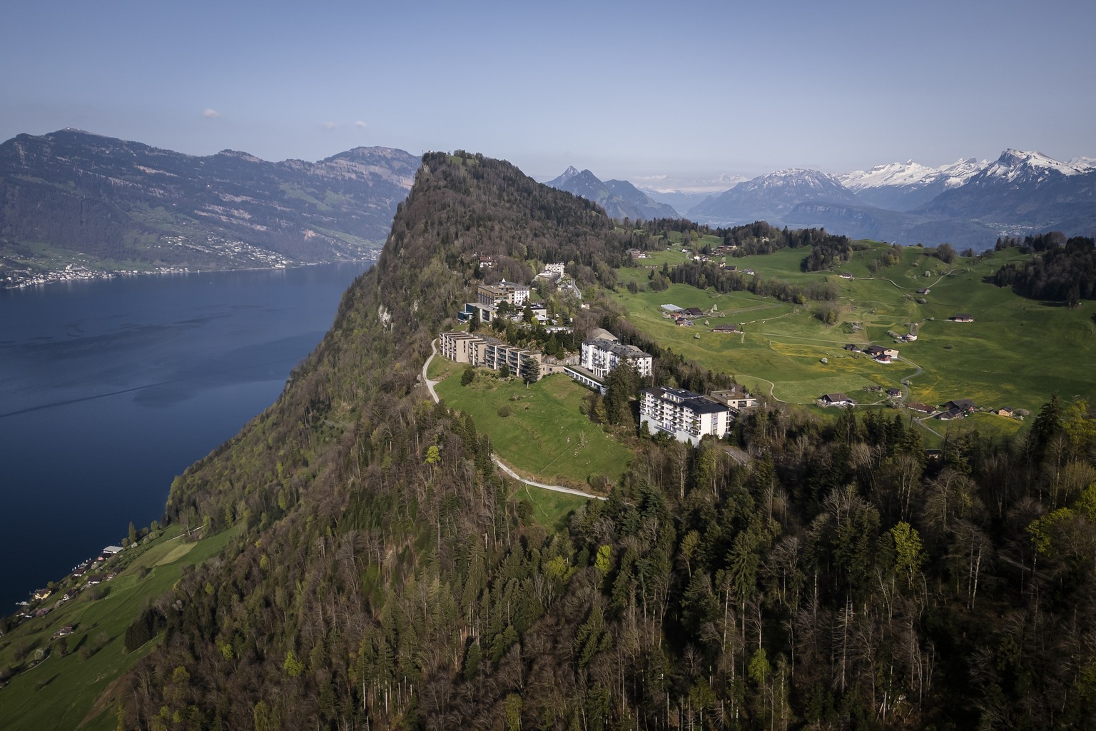 The mount Buergenstock with the Buergenstock Resort is seen above Lake Lucerne on Thursday, April 11, 2024 in Obbuergen, central Switzerland. Switzerland&#039;s Buergenstock resort is to host a two-da ...