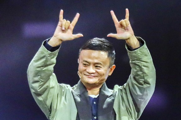 In this photo taken Friday, Nov. 10, 2017, Jack Ma is founder of China&#039;s biggest e-commerce giant Alibaba Group, attends a star-studded 2017 Tmall 11.11 Global Shopping Festival gala, in Shanghai ...