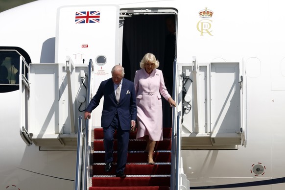 epa12917923 Britain's King Charles III (L) and Queen Camilla (R) arrive at Joint Base Andrews, Maryland, USA, 27 April 2026. King Charles III and Queen Camilla are visiting the US on a four-day s ...