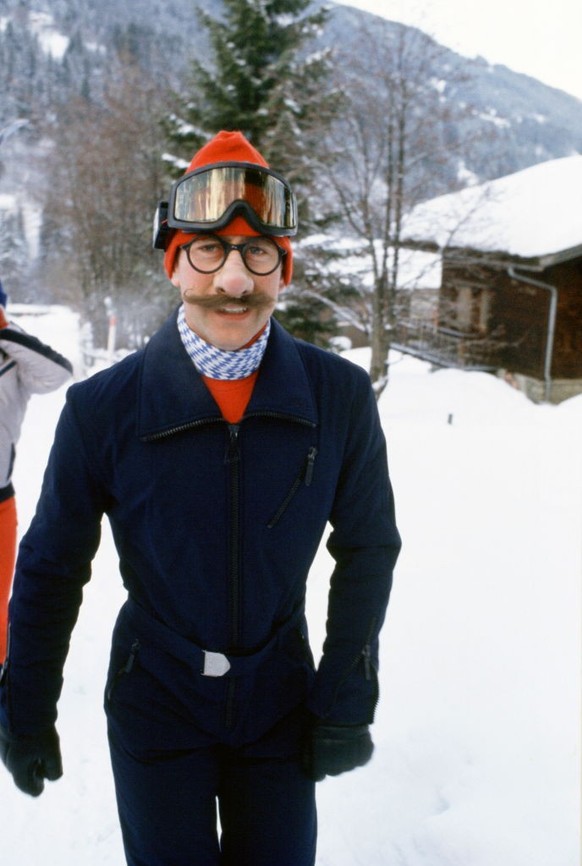 KLOSTERS, SWITZERLAND - JANUARY 23: Prince Charles Wearing Joke Mask To Tease Press Photographers During A Skiing Holiday In Klosters, Switzerland (Photo by Tim Graham Photo Library via Getty Images)