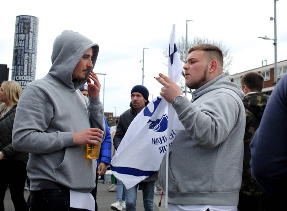 Tottenham Hotspur v Newcastle United 03 April 2022 London - Premier League Football - Tottenham Hotspur v Newcastle United - two Tottenham fans enjoy a beer and a cigarette outside the stadium before  ...