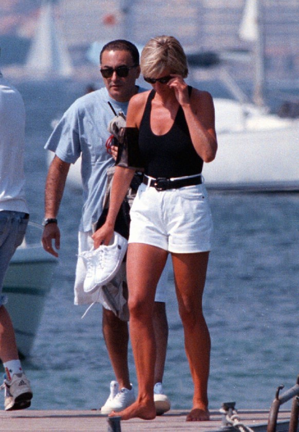 FILE- In this Friday, Aug. 22, 1997 file photo, Britain&#039;s Diana, Princess of Wales, and her companion Dodi Fayed, walk on a pontoon in the French Riviera resort of St. Tropez. It has been 20 year ...