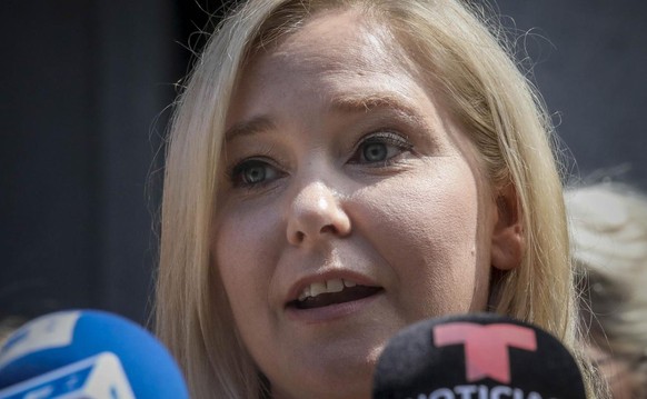 FILE - In this Aug. 27, 2019 file photo, Virginia Roberts Giuffre, a sexual assault victim, speaks during a press conference outside a Manhattan court in New York. British socialite Ghislaine Maxwell  ...