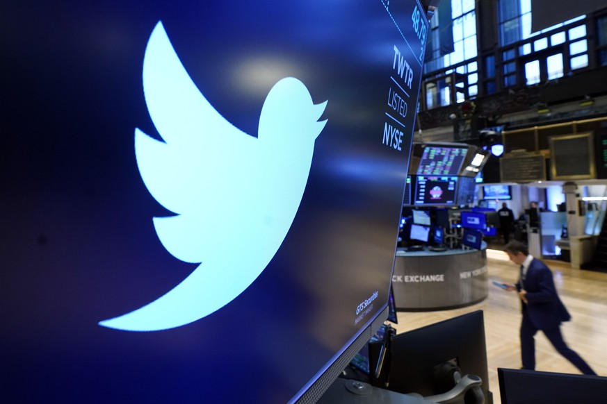 FILE - The logo for Twitter appears above a trading post on the floor of the New York Stock Exchange on Nov. 29, 2021. Elon Musk���s ties to China through his role as electric car brand Tesla���s bigg ...