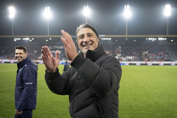 Switzerland&#039;s head coach Murat Yakin, right, and his assitant Vincent Cavin, left, celebrate after directly qualifying for the FIFA World Cup Qatar 2022 after the 2022 FIFA World Cup European Qua ...