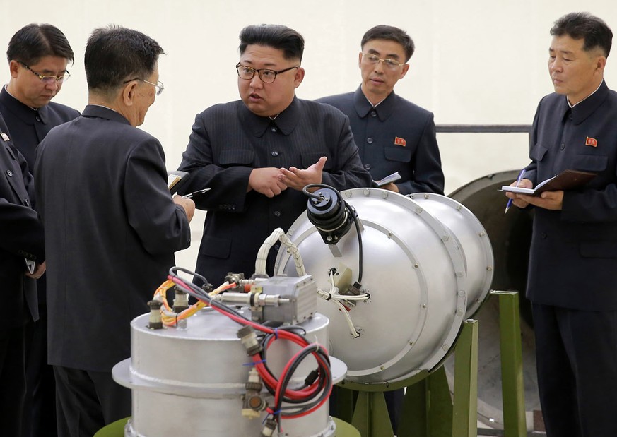 FILE - This undated file image distributed on Sept. 3, 2017, by the North Korean government, shows North Korean leader Kim Jong Un at an undisclosed location. As North Korea conducts more powerful wea ...