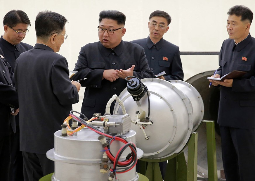 FILE - This undated file image distributed on Sept. 3, 2017, by the North Korean government, shows North Korean leader Kim Jong Un at an undisclosed location. As North Korea conducts more powerful wea ...