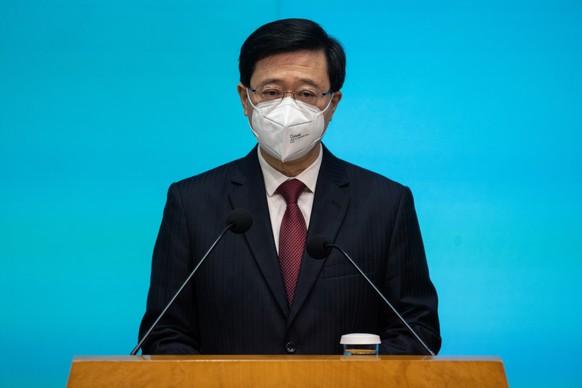 epa10052631 Hong Kong Chief Executive John Lee Ka-chiu speaks during a press conference at the Central Government Offices in Hong Kong, China, 05 July 2022. Lee started his term as Chief Executive on  ...