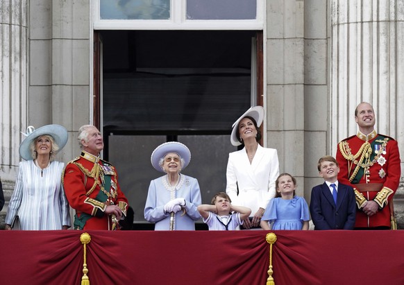 Camilla, the Duchess of Cornwall, Prince Charles, Queen Elizabeth II, Kate, Duchess of Cambridge, Prince Louis, Princess Charlotte, Prince George, and Prince William watch from the balcony of Buckingh ...