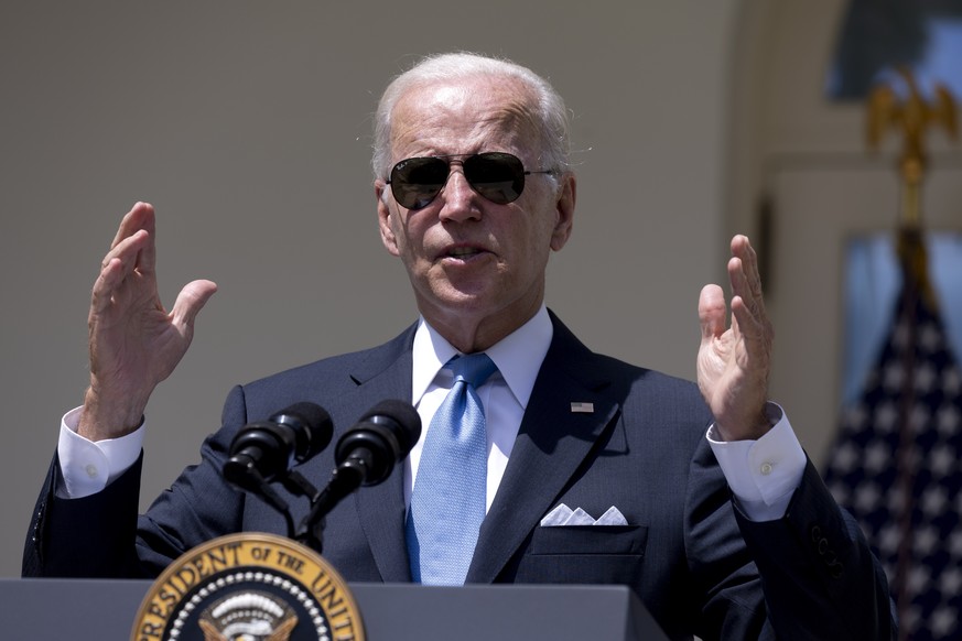 epa10094085 US President Joe Biden delivers remarks in the Rose Garden of the White House during his first public in-person appearance since contracting Covid-19, in Washington, DC, USA, 27 July 2022. ...