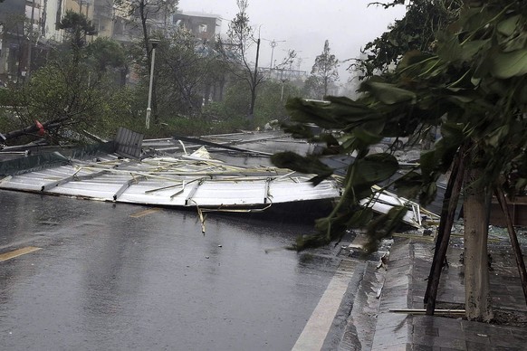 epa11590854 A handout photo made available by Vietnam News Agency shows debris on a street as typhoon Yagi makes landfall, in Quang Ninh province, Vietnam, 07 September 2024. Typhoon Yagi, Asia&#039;s ...