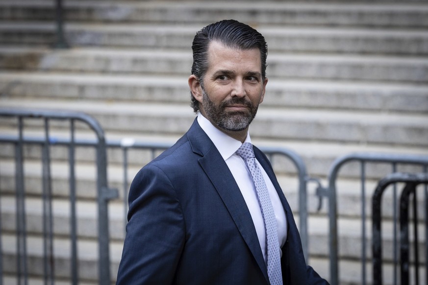 Donald Trump, Jr. looks on outside the Supreme Court, Monday, Nov. 13, 2023, in New York. Trump Jr. returned to the stand in the court today as defense lawyers start calling witnesses in the civil fra ...