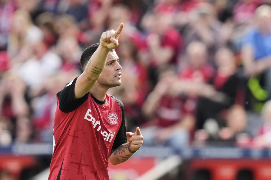 Leverkusen&#039;s Granit Xhaka gestures during the German Bundesliga soccer match between Bayer Leverkusen and FC Augsburg at the BayArena in Leverkusen, Germany, Saturday, April 26, 2025. (AP Photo/M ...