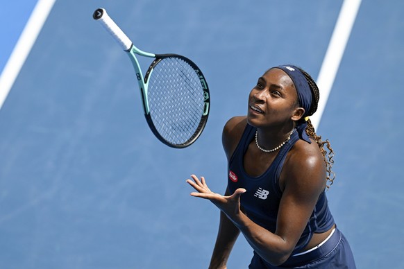 Coco Gauff of the United States throws her racket in the air during her semifinal match against compatriot Emma Navarro at the ASB Tennis Classic in Auckland, New Zealand, Saturday, Jan. 6, 2024. (And ...