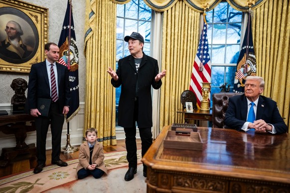 Washington, DC - February 11 : Elon Musk, with his son X Æ A-Xii, speaks with President Donald J Trump and reporters in the Oval Office at the White House on Tuesday, Feb 11, 2025 in Washington, DC. ( ...