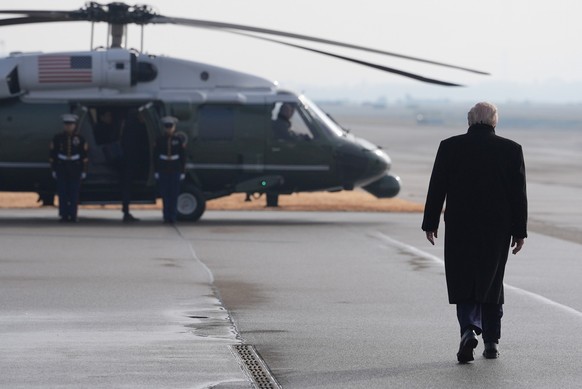 President Donald Trump walks toward Marine One to transfer to Davos after arriving at the airport in Zurich, Switzerland, Wednesday, Jan. 21, 2026. (AP Photo/Evan Vucci)