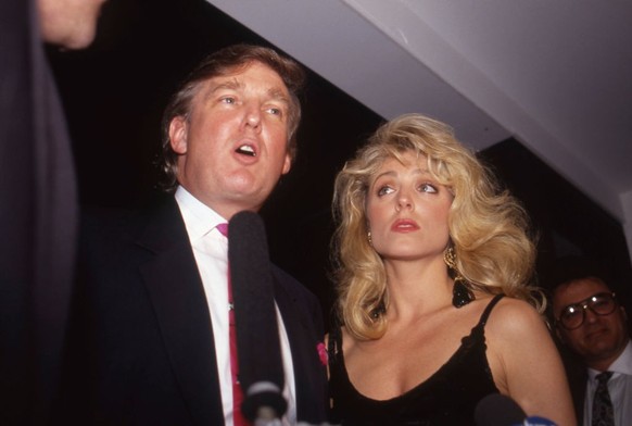 ATLANTIC CITY, NJ - APRIL 19: Donald Trump and Marla Maples attend the Evander Holyfield vs. George Foreman boxing match at the Trump Plaza Hotel and Casino. (Photo by Andrew D. Bernstein/Getty Images ...