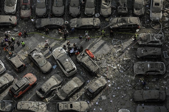 epa10731555 (FILE) - Cars covered in debris in the yard of an apartment block damaged by rocket fragments in Kyiv (Kiev), Ukraine, 24 June 2023, amid the Russian invasion. At least three people were k ...