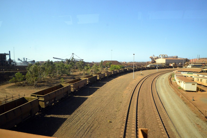 - PORT HEDLAND, AUSTRALIA: A train pictured during a visit of BHP s Nelson Point Iron Ore Port activities on day three of an economic mission to Australia and New Zealand, Tuesday 20 November 2012. ER ...