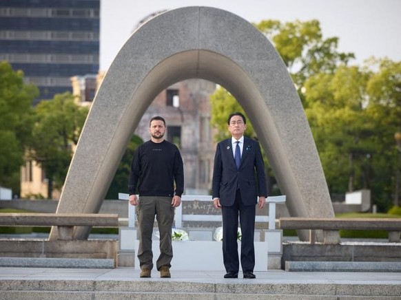 This handout photograph taken and released by the Ukrainian Presidential Press Service on May 21, 2023, shows Ukraine&#039;s President Volodymyr Zelensky (L) and Japan&#039;s Prime Minister Fumio Kish ...