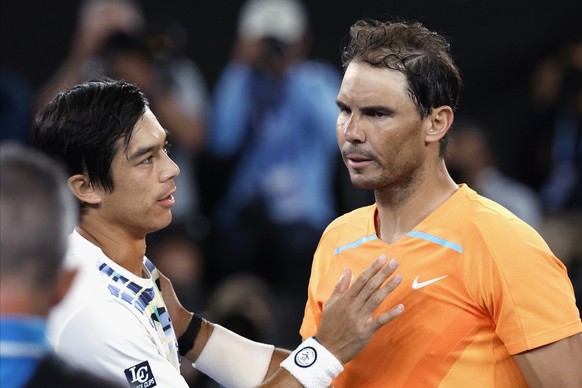 Rafael Nadal, right, of Spain congratulates Mackenzie McDonald of the U.S., following their second round match at the Australian Open tennis championship in Melbourne, Australia, Wednesday, Jan. 18, 2 ...