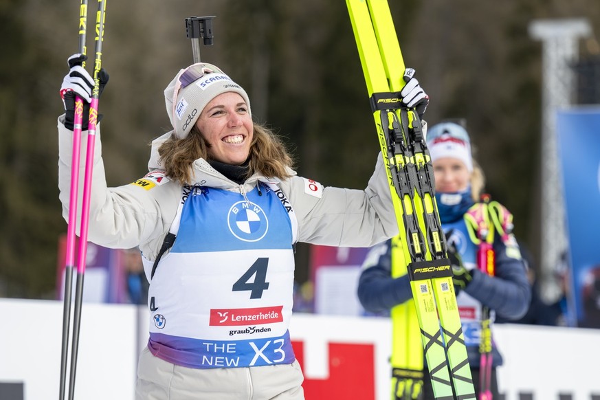 Lena Haecki-Gross of Switzerland reacts during the medal ceremony after the women?s 10k pursuit race at the IBU Biathlon World Championships, on Sunday, February 16, 2025, in Lenzerheide, Switzerland. ...