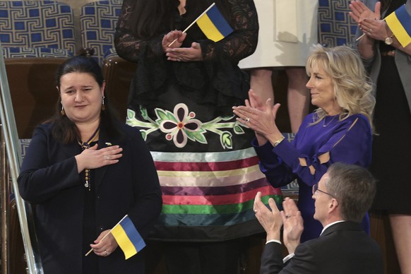 Ukrainian Ambassador to the United States Oksana Markarova, left, is recognized as President Joe Biden delivers his State of the Union address to a joint session of Congress at the Capitol, Tuesday, M ...