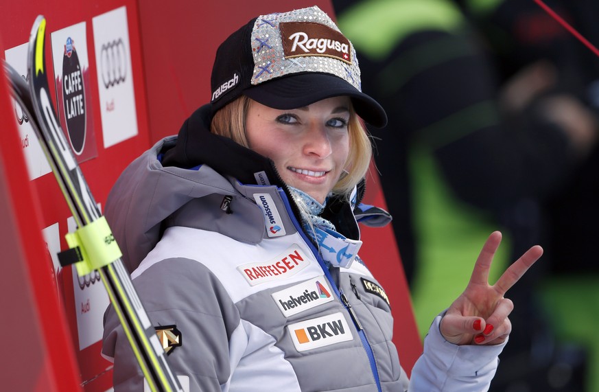 Switzerland&amp;#039;s Lara Gut gesticulates after completing a women&amp;#039;s Alpine ski downhill race, in La Thuile, Italy, Friday, Feb. 19, 2016. (AP Photo/Alessandro Trovati)