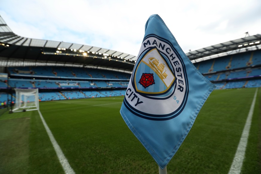 FILE - The club logo decorates a corner flag before the English Premier League soccer match between Manchester City and Newcastle United at the Etihad Stadium in Manchester, England, Saturday, Sept. 1 ...