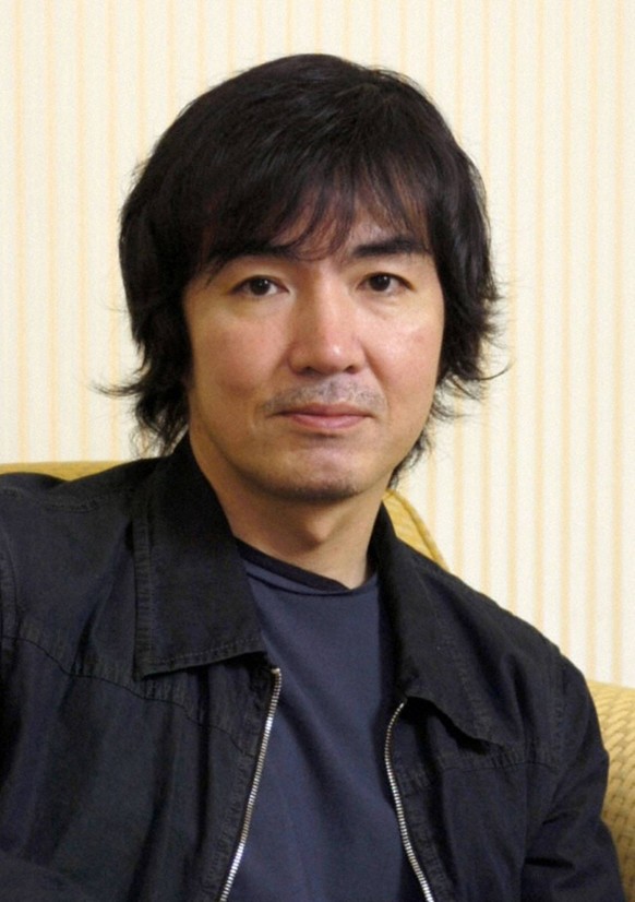 TOKYO, Japan - File photo shows Japanese novelist Keigo Higashino. Mystery Writers of America on Jan. 19, 2012, announced its nominees for the 2012 Edgar Allan Poe Awards, including The Devotion of Su ...