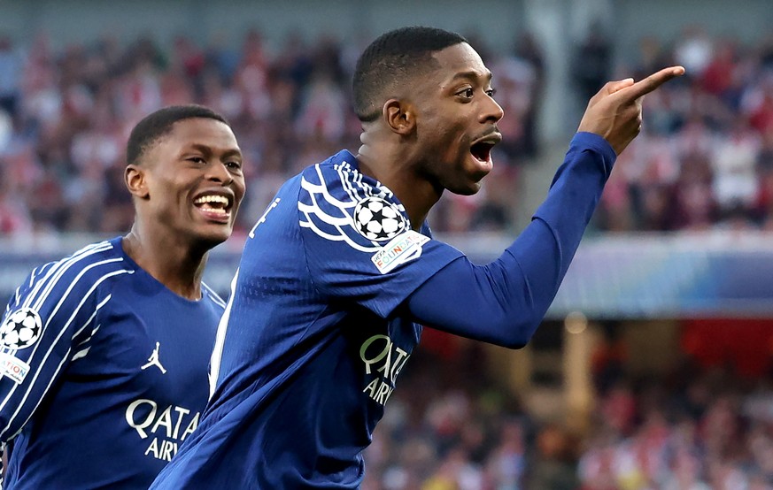 epaselect epa12063429 Ousmane Dembele (R) of PSG celebrates after scoring the opening goal during the UEFA Champions League semi-finals, 1st leg soccer match between Arsenal FC and Paris Saint-Germain ...