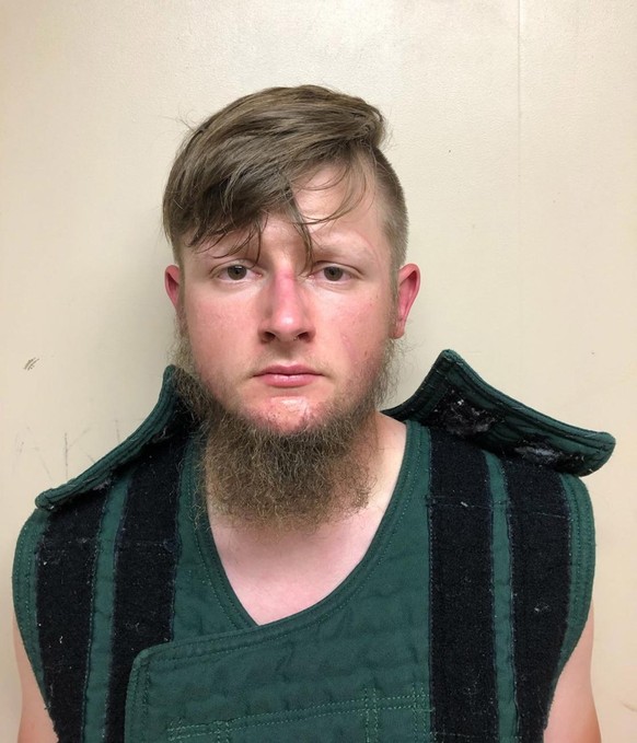 epa09079029 A handout booking photo made available by the Crisp County Sheriff&#039;s Office shows Robert Aaron Long, 21, a suspect in series of fatal shootings that occured in three massage parlors i ...