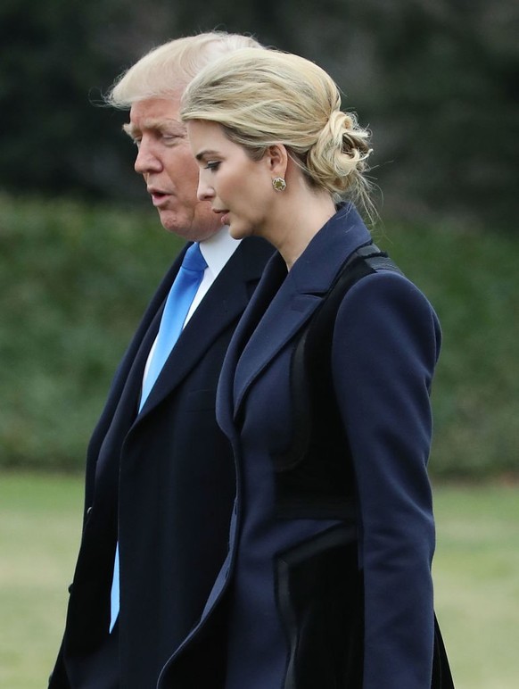 WASHINGTON, DC - FEBRUARY 01: U.S. President Donald Trump and his daughter Ivanka Trump walk toward Marine One while departing from the White House, on February 1, 2017 in Washington, DC. Trump is mak ...