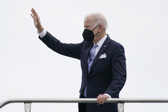 President Joe Biden waves as he boards Air Force One at Columbia Metropolitan Airport in West Columbia, S.C., en route to Philadelphia after speaking at the South Carolina State University&#039;s 2021 ...