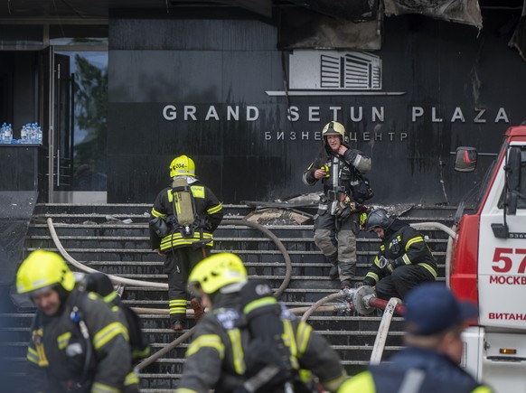 Russian Emergency Situation ministry&#039;s firefighters work at the scene of a fire at a business center in Moscow, Russia, Friday, June 3, 2022. A massive fire has engulfed a business center in west ...