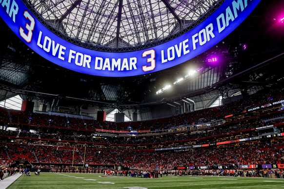 epa10396199 Fans and supporters participate in a pregame &#039;Moment of Support&#039; for Buffalo Bills safety Damar Hamlin during pregame warmups before a NFL American football game between the Tamp ...