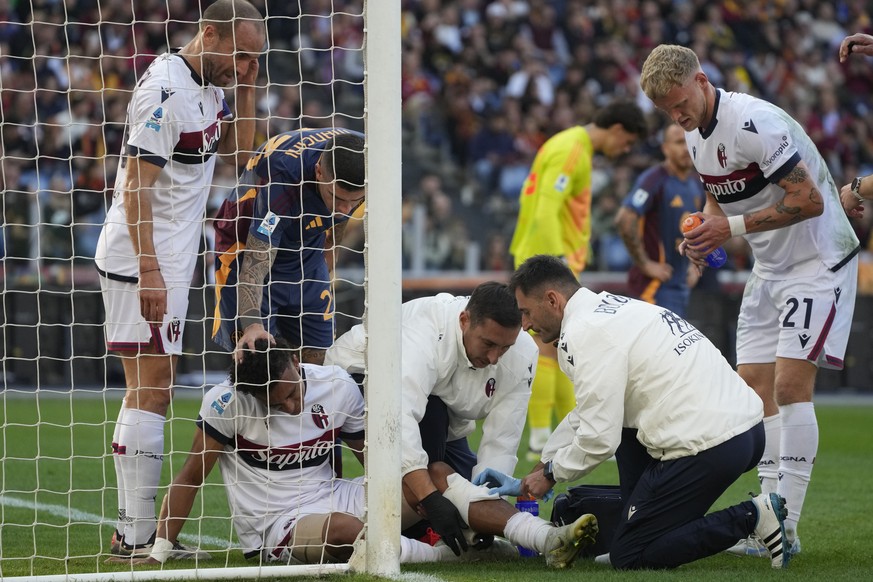 Bologna&#039;s Dan Ndoye is treated during the Serie A soccer match between Roma and Bologna at Rome&#039;s Olympic Stadium, Sunday, Nov. 10, 2024. (AP Photo/Gregorio Borgia)