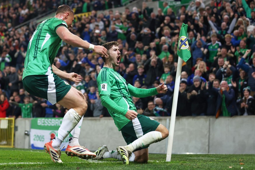 Ireland&#039;s Trai Hume, right, celebrates after scoring his side&#039;s second goal during a World Cup 2026 group A qualifying soccer match between Northern Ireland and Slovakia at Windsor Park stad ...