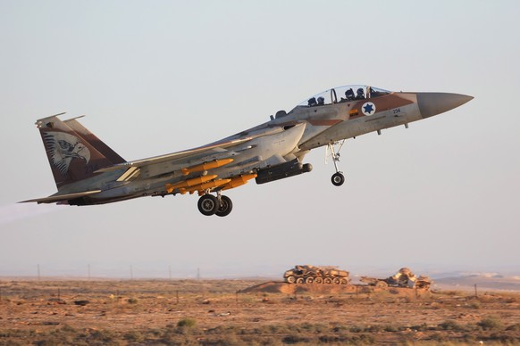epa10717789 Israeli Air Force F15 fighter aircraft takes off during an air show at the graduation ceremony of new combat fighter pilots of the Israeli Air Forces at the Hatzerim Air Force base, outsid ...