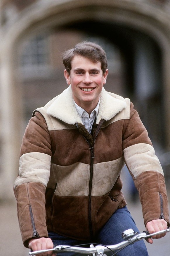 CAMBRIDGE, UNITED KINGDOM - MARCH 10: Prince Edward Riding His Bicycle At Cambridge University. Session Pictures To Mark His 21st Birthday (Photo by Tim Graham Photo Library via Getty Images)