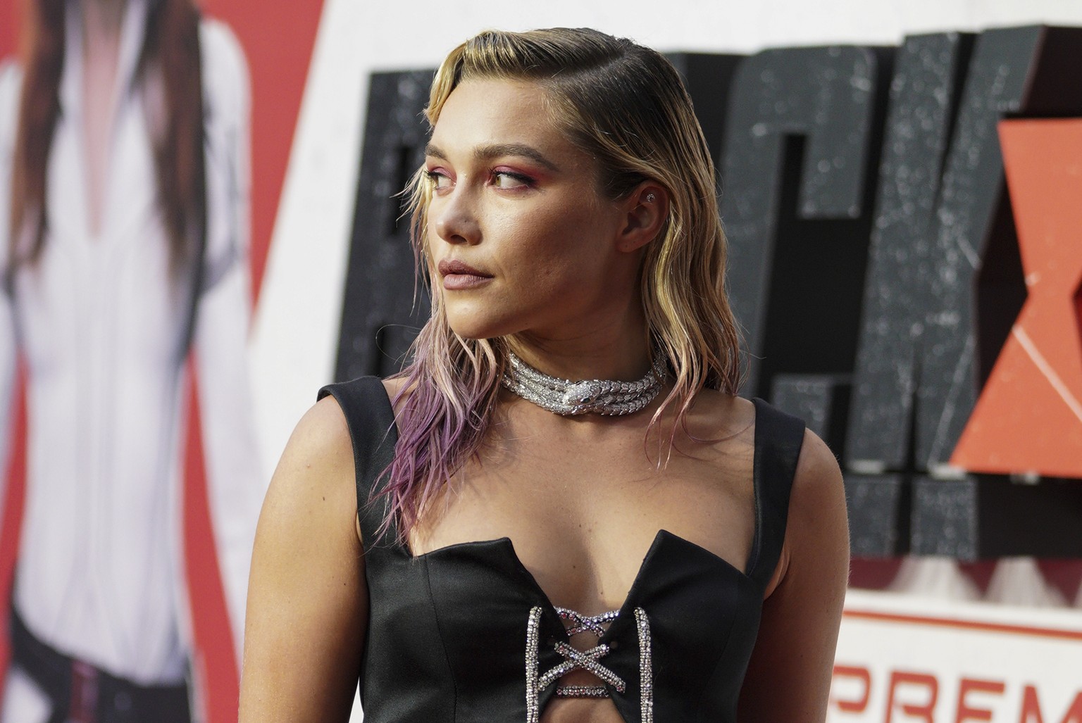 Florence Pugh poses for photographers upon arrival at a fan event for the film Black Widow in London, Tuesday, June 29, 2021. (AP Photo/Scott Garfitt)
Florence Pugh