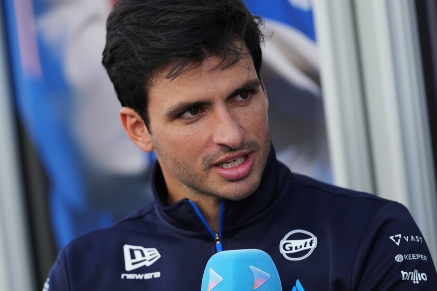 Williams driver Carlos Sainz of Spain speaks during an interview with a South Korean media in the padock in Suzuka, central Japan, Thursday, March 26, 2026, ahead of Sunday's Japanese Formula One ...