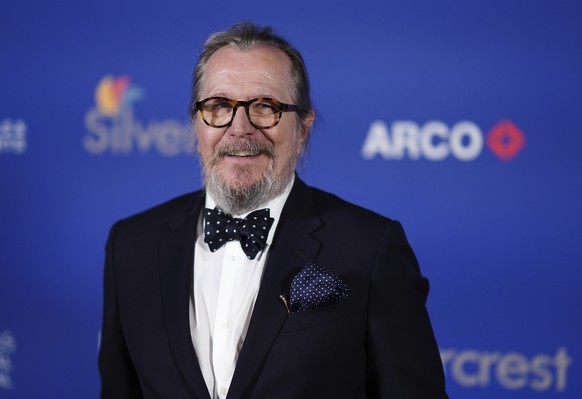 FILE - Gary Oldman poses in the press room during the 36th annual Palm Springs International Film Festival Awards Gala on Friday, Jan. 3, 2025, in Palm Springs, Calif. (Photo by Jordan Strauss/Invisio ...