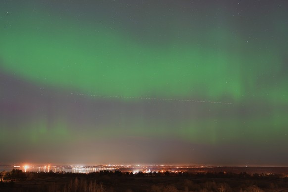 An aurora borealis, also known as the northern lights, fill the night sky over the Tallinn bay of the Baltic sea in Tallinn, Estonia, late Friday, March 20, 2026. (AP Photo/Sergei Grits)
Estonia North ...